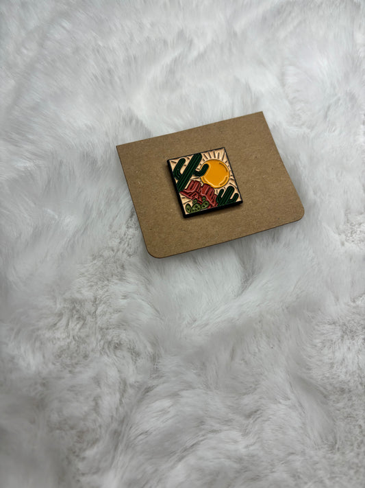 Desert sunset pin